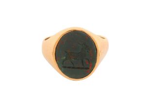 AN INTAGLIO BLOODSTONE RING