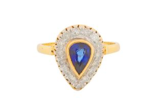 A SAPPHIRE AND DIAMOND PEAR-SHAPED RING
