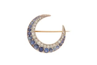 A SAPPHIRE AND DIAMOND CRESCENT MOON BROOCH