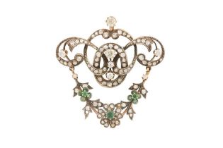 AN EMERALD AND DIAMOND PENDANT NECKLACE