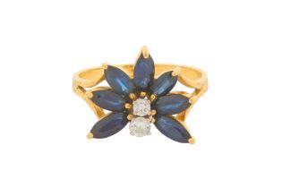 AN 18CT GOLD SAPPHIRE AND DIAMOND RING