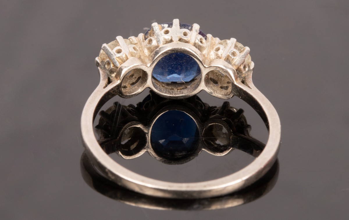 A sapphire and diamond three stone ring, - Image 4 of 4