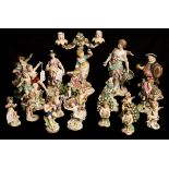 A group of nineteen late 19th/early 20th Century Continental porcelain figures in the style of