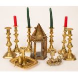 Three pairs of baluster brass candlesticks, the largest 23.