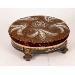 A Victorian beadwork stool with ebonised and gilded mounts,