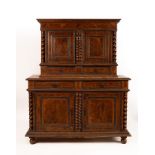 An Italian walnut cabinet, circa 1650, strung with box and ebony and with milled moulding,