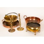 Two copper preserving pans, a brass example,