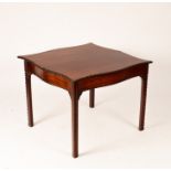 A George III mahogany serpentine front tea table, with carved borders on moulded chamfered legs,