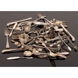 A quantity of silver to include a silver Albert chain, flatware, napkin rings,