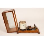 An oak cased barograph,