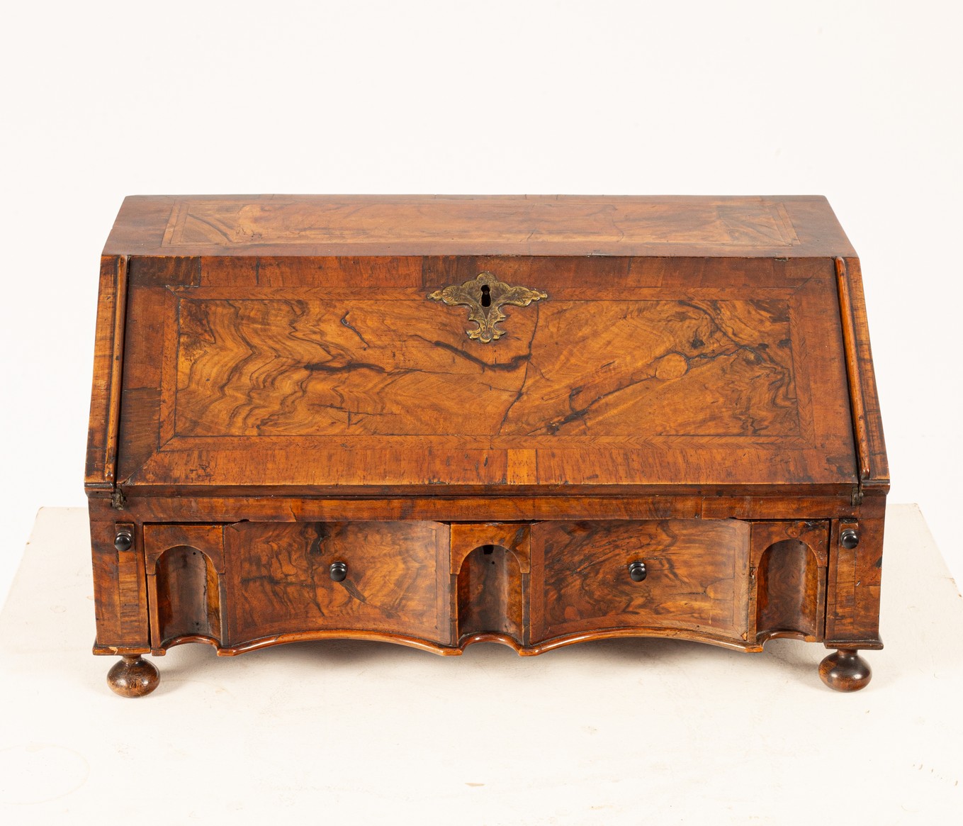 A Queen Anne walnut dressing table bureau, circa 1710,