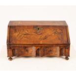 A Queen Anne walnut dressing table bureau, circa 1710,