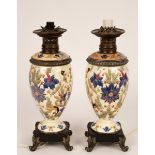 A pair of Victorian pottery table lamps, converted from oil lamps,