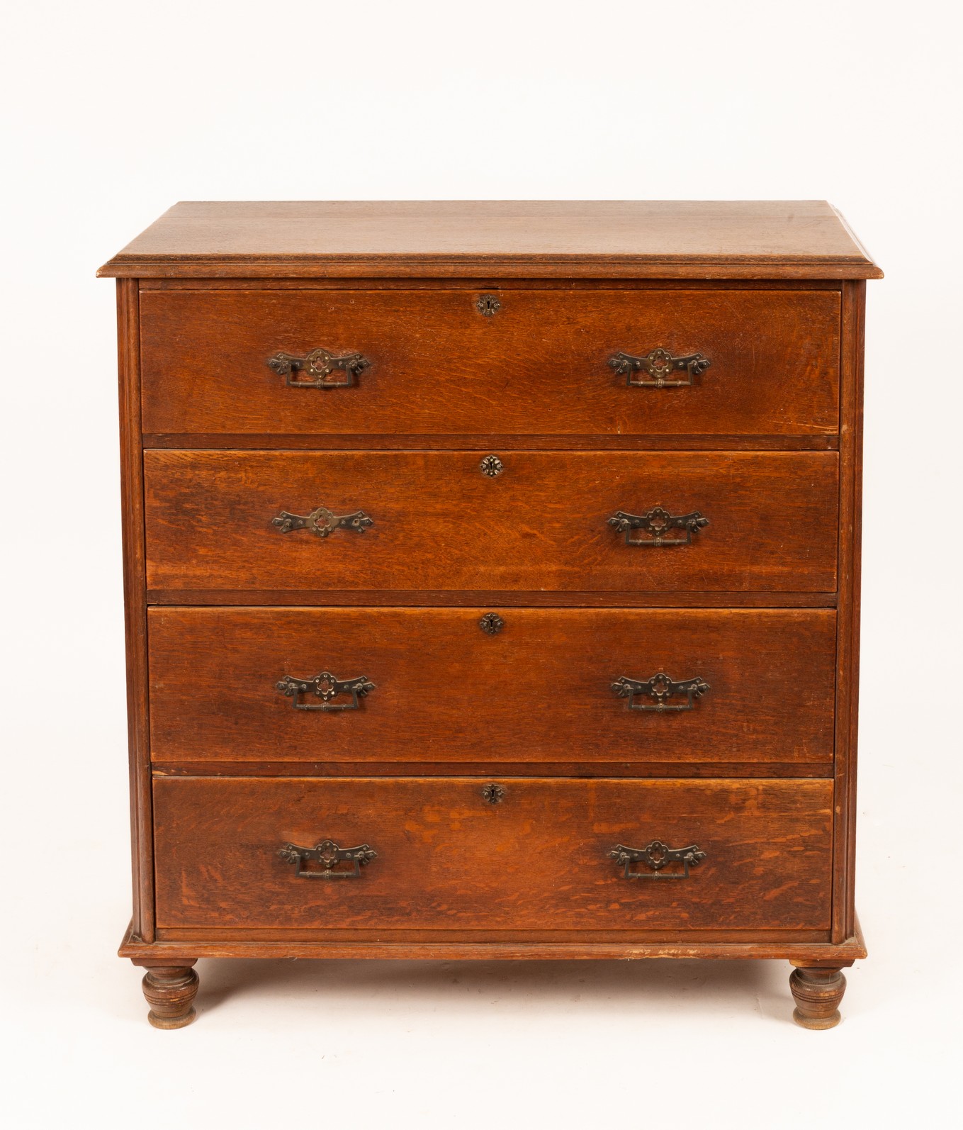 A Victorian oak chest of four long drawers on turned feet, 107.