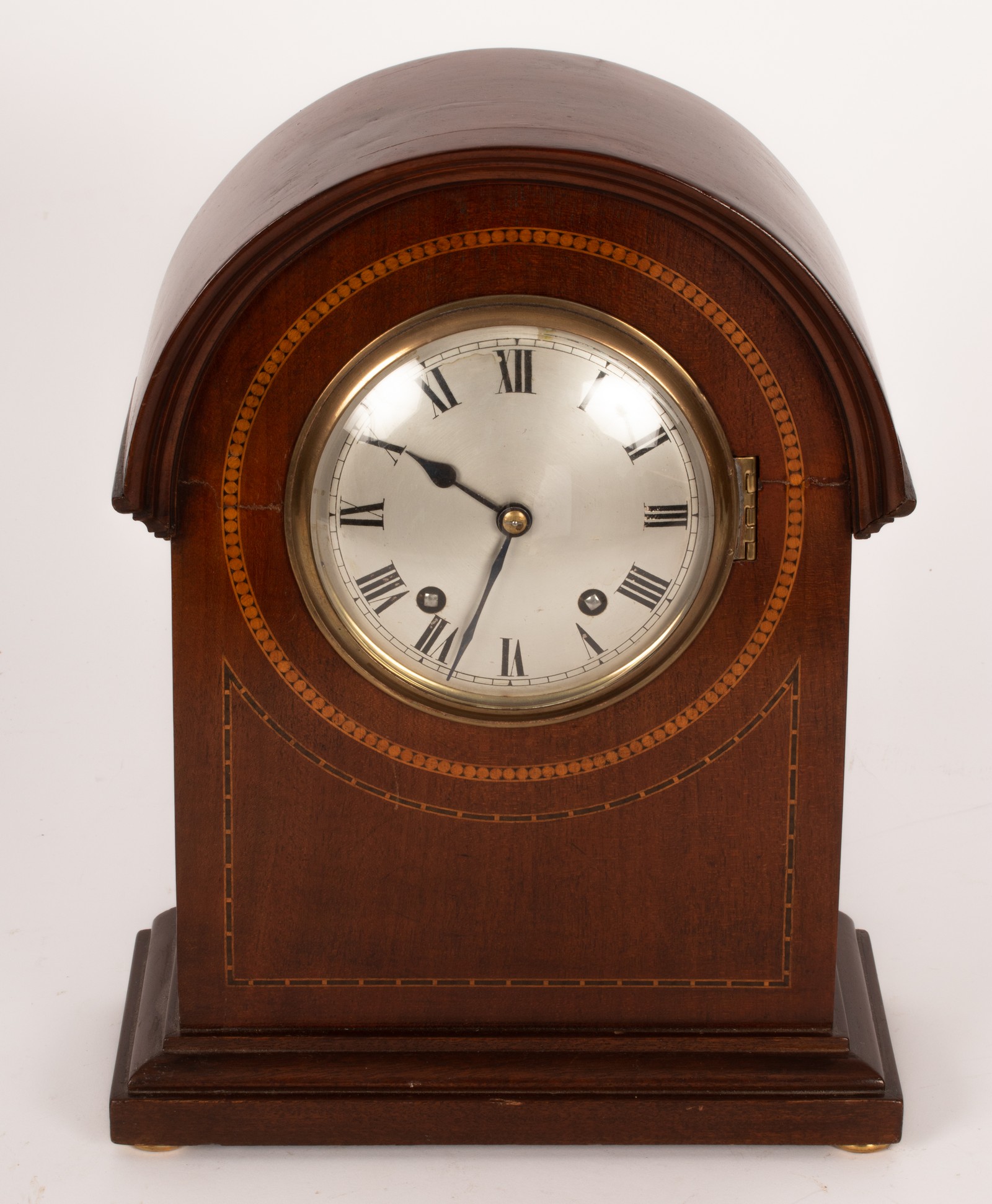 An Edwardian mahogany bracket clock,