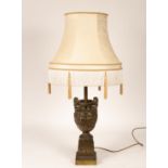 A Victorian style brass table lamp, of Classical twin-handled urn form,