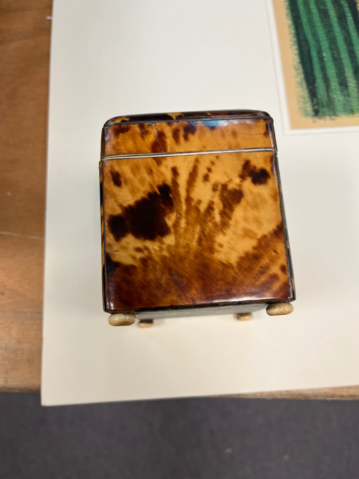 A late 18th Century rectangular tortoiseshell tea caddy on ivory bun feet, - Image 4 of 10