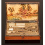 A Palais Royal sewing set contained in a satinwood fitted case with gilt metal mounted