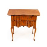 A 19th Century Dutch marquetry chest with serpentine front, fitted two drawers on cabriole legs,