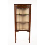 An Edwardian bowfront display cabinet,