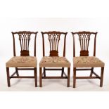 Three George III mahogany dining chairs with interlaced splat backs CONDITION REPORT: