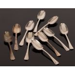 Ten Queen Anne rattail silver dessert spoons, circa 1710, marks indistinct, crest of Chisholm,