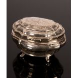 An oval silver tea caddy, Goldsmiths & Silversmiths Co. Ltd, London 1925, 13.