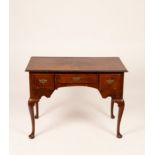 A 19th Century rosewood lowboy, three fitted drawers above tapered legs and pad feet,