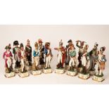 Fourteen figures of Napoleonic soldiers, gilt N,