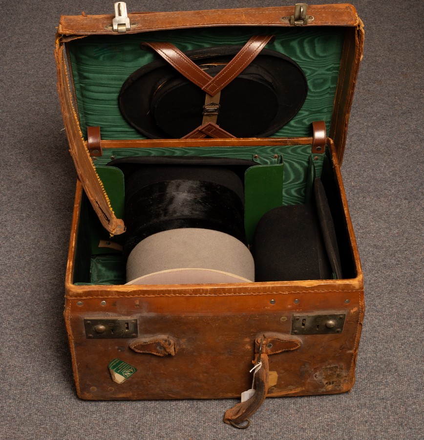 A late 19th/early 20th Century leather hat box, initialled AMC to the cover,