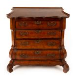 A Dutch walnut bombé front chest of four drawers,