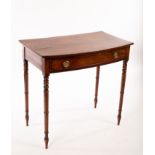 A Regency mahogany bowfront side table, fitted a single drawer, on turned tapering legs,