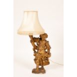 An early 18th Century figure of Plenty adapted as a table lamp,