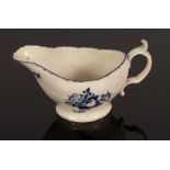 A Caughley sauce boat, circa 1780, the moulded rim above pleat moulded lower part,