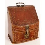 A 19th Century gilt and tooled leather desk tidy with segmented interior, 22.