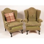 A pair of wingback armchairs on dwarf cabriole legs CONDITION REPORT: Condition