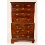 A George III mahogany chest on chest, the upper section of two short over three long drawers,