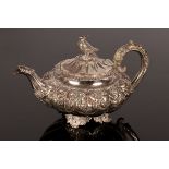 A William IV silver teapot, Jonathan Hayne, London 1831, with scrolled handle and bird finial,