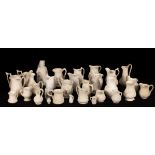 A quantity of saltware jugs, various patterns,