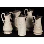 Five saltware jugs, decorated figures in relief, pewter lids,