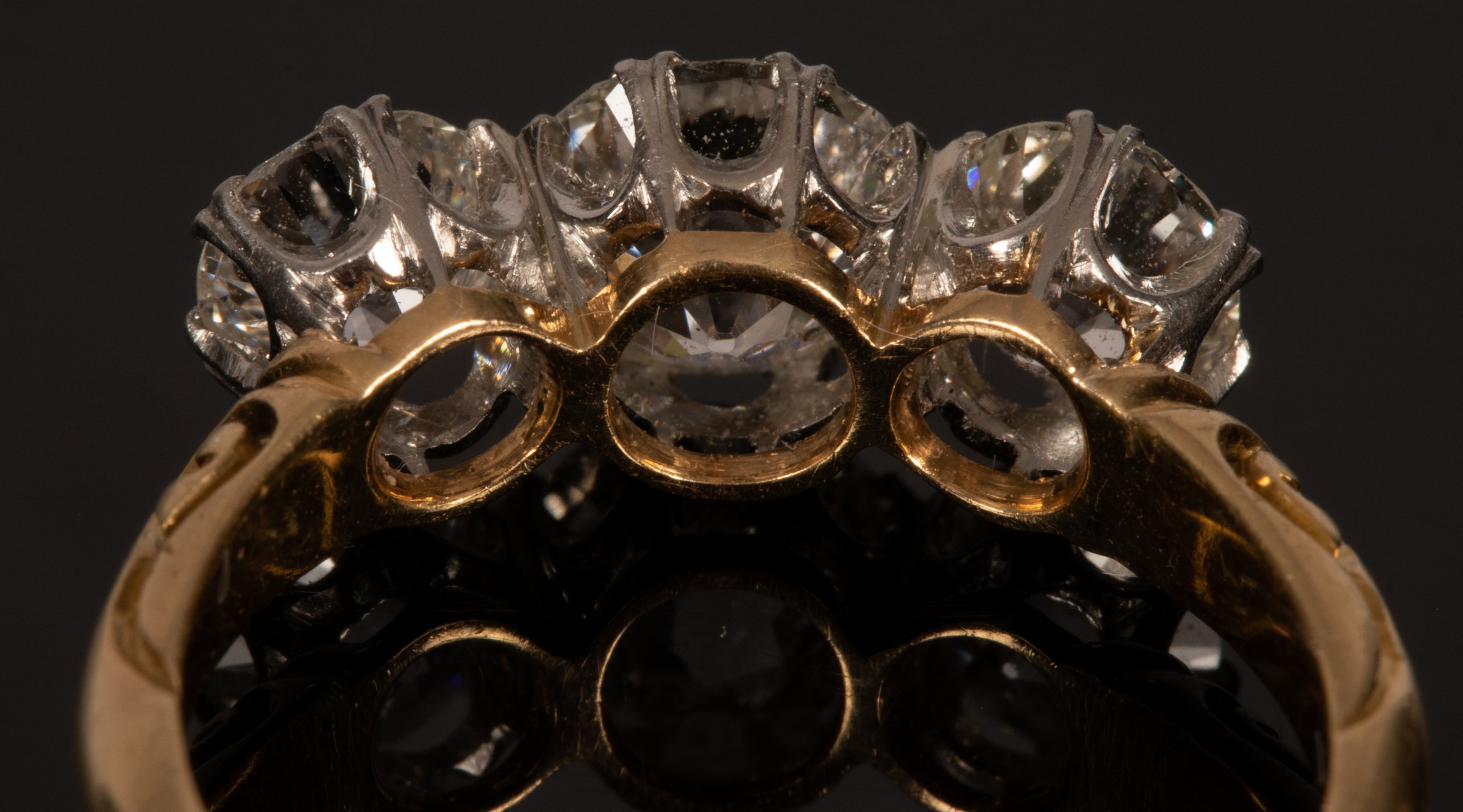 A diamond three-stone ring, the central stone of approximately 1. - Image 3 of 7