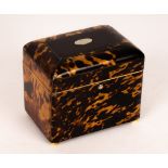 A late 18th Century rectangular tortoiseshell tea caddy on ivory bun feet,