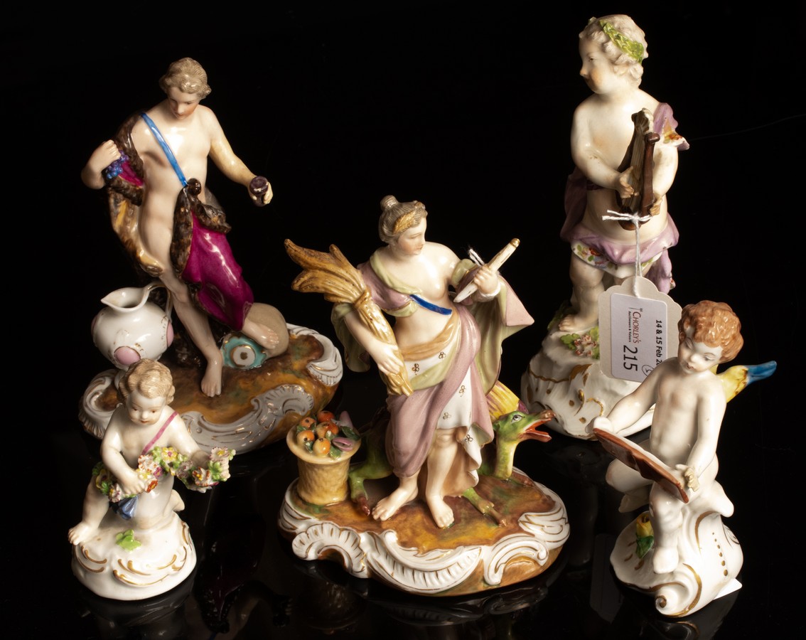 A Meissen figure of a cherub playing a lyre, circa 1760, and four Meissen style figures,