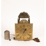 An 18th Century striking lantern clock, the 11 inch dial possibly associated and signed 'Tho Trigg',