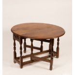 An oak oval two-flap table,