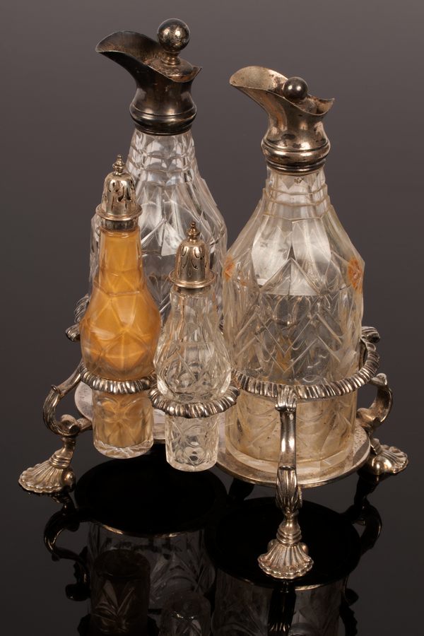 An early George III silver cruet stand, R Peaston, London 1763,