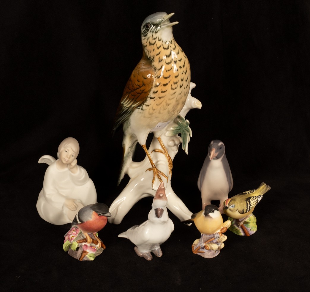 A group of porcelain figures of birds,