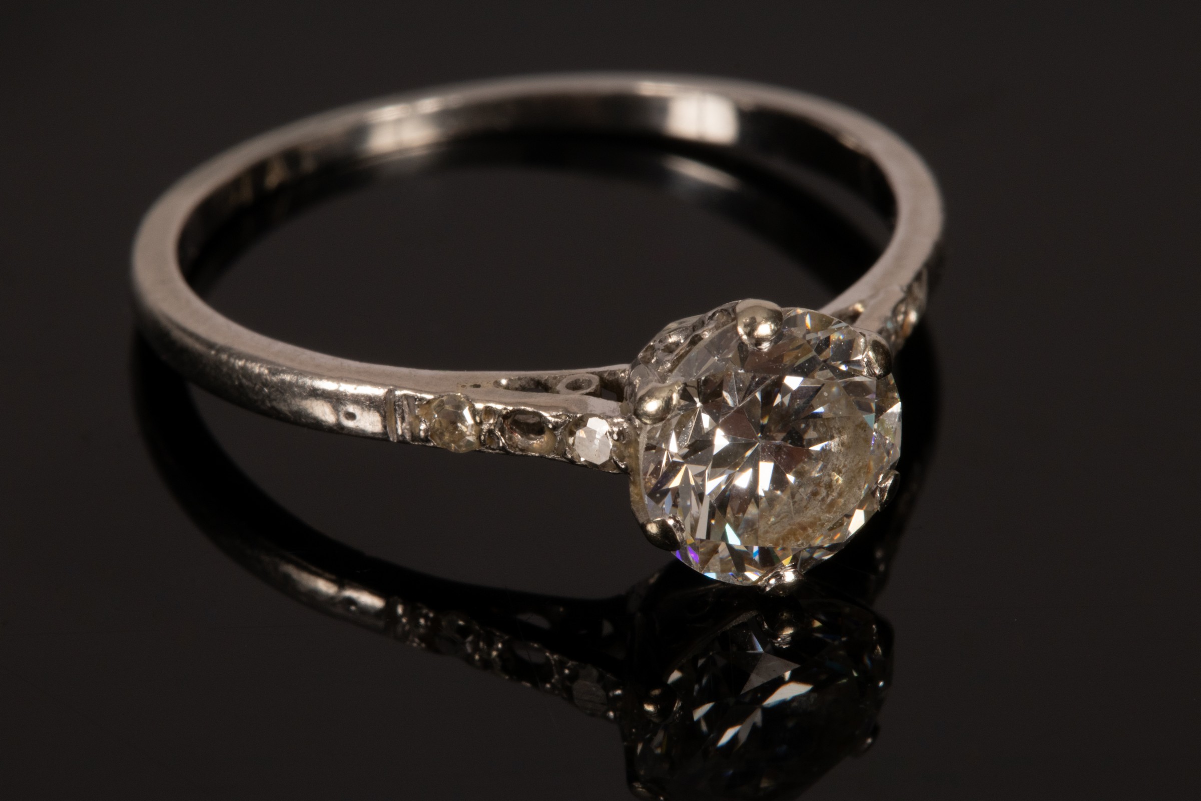 An Art Deco diamond solitaire ring, the old brilliant cut stone of approximately 1. - Image 2 of 3