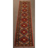 A Malayir Runner, West Persia, the sky blue field with repeating madder medallions, ivory spandrels,