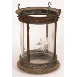 A brass framed hall lantern of cylindrical form, the curved glazed panels with star-cut decoration,